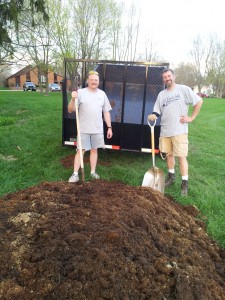 Volunteers contributing a very large load of composted horse manure for the community garden.  Trust me, it makes stuff grow real nice!